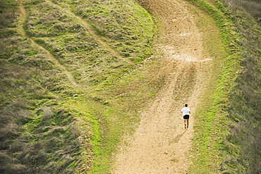 Person running on trail