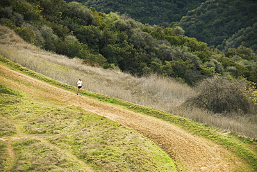 Person running on trail