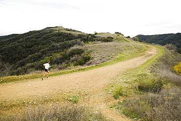 Person running on trail