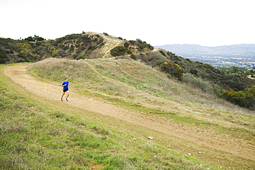 Person running on trail