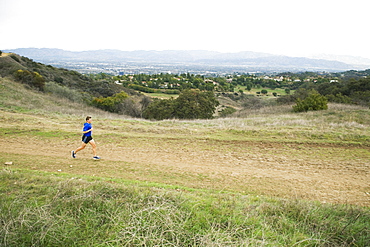 Person running on trail