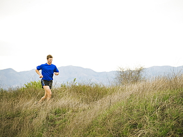 Person running on trail