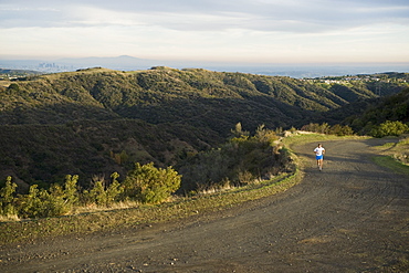 Person running on trail