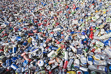 Pile of aluminum cans at recycling plant