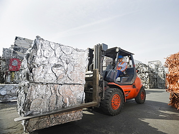 Forklift driver at recycling plant