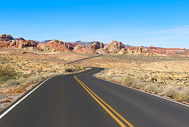 Empty road leading through desert, Valley of Fire State Park, California, USA