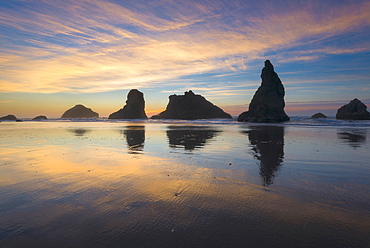 Beach with stack rocks at sunset, Bandon, Oregon