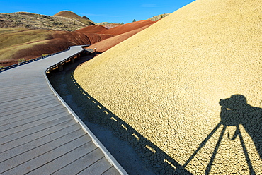 Painted Hills and photographer's shadow, Wheeler County, Oregon