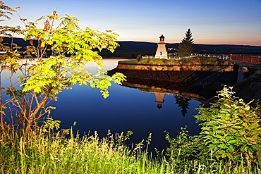 Anderson Hollow Lighthouse by pond at dusk, New Brunswick, Canada