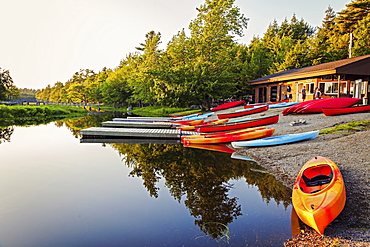 Kayaks on lakeshore, Nova Scotia, Canada