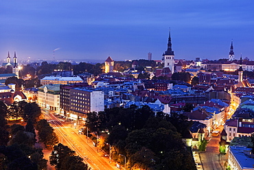 Elevated view of illuminated city at dusk, Tallin, Estonia