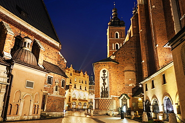 Street-level view of illuminated St. Barbara Church, Poland