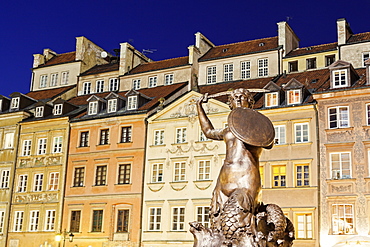 Mermaid of Warsaw against buildings, Poland