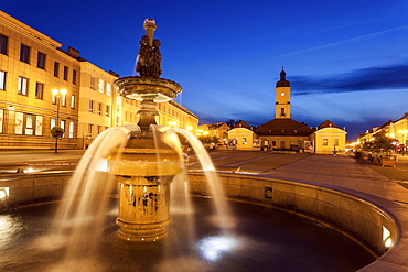 Poland, Podlaskie, Bialostok Fountain on illuminated town square, Poland