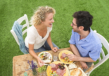 Couple having rustic breakfast