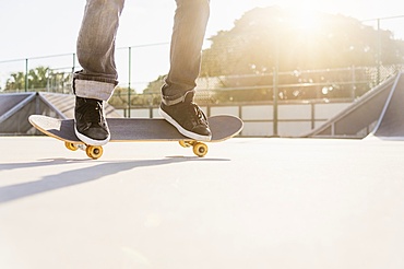 Man skateboarding in skatepark, West Palm Beach, Florida