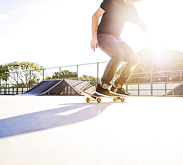 Man skateboarding in skatepark, West Palm Beach, Florida