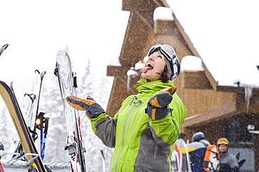 Portrait of woman enjoying snow, Whitefish, Montana, USA