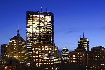 Illuminated office buildings at dusk, Copley Square, Boston, Massachusetts 