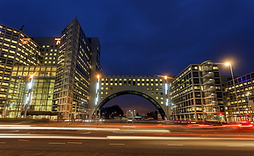 Light trails before illuminated building, The Hague, South Holland, Netherlands