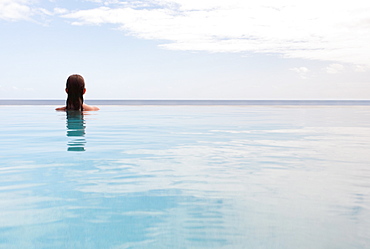 Woman in swimming pool, St. John, US Virgin Islands