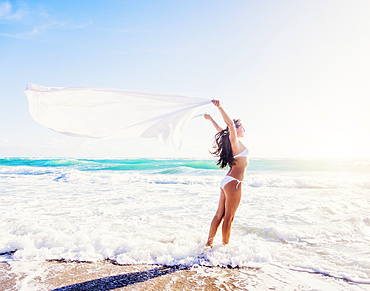 Woman in white bikini on beach, Jupiter, Florida,USA