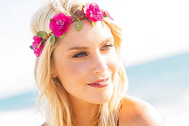 Young woman smiling on beach