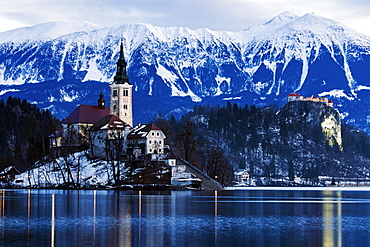 View of Church of the Assumption with lake and mountain, Slovenia, Bled, Church of the Assumption, Bled Castle