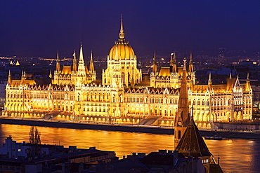 Hungarian Parliament illuminated at night, Hungary, Budapest, Hungarian Parliament,Protestant church, Fisherman's Bastion