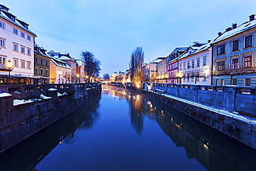 View along Ljubljanica River at dusk, Slovenia, Ljubljana, Ljubljanica River