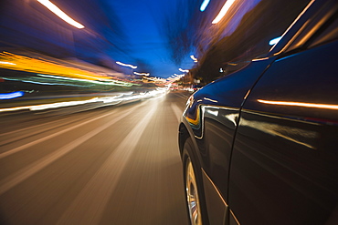 Car speeding through street, USA, Massachusetts, Boston