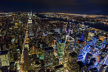 USA, New York, New York City, Manhattan, Aerial view of illuminated skyline at night