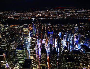 USA, New York, New York City, Manhattan, Aerial view of illuminated skyline with Times Square at night