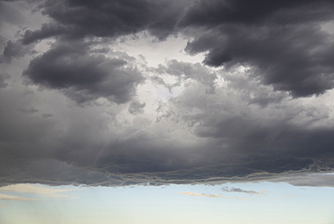 Storm clouds gathering on late evening sky