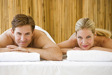 Couple on spa treatment tables