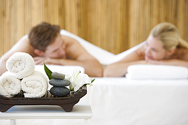 Couple receiving spa treatment