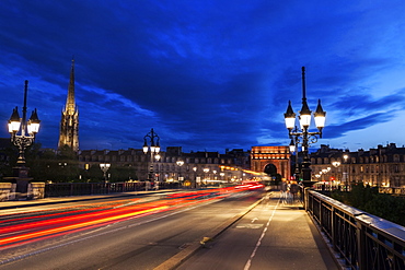 France, Nouvelle-Aquitaine, Bordeaux, Cailhau Gate, Incidental people and cars in long exposure