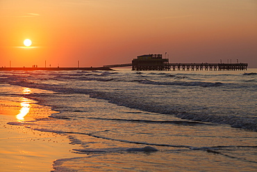 Beach and pier at sunset in Galveston, Texas, Galveston, Texas, USA