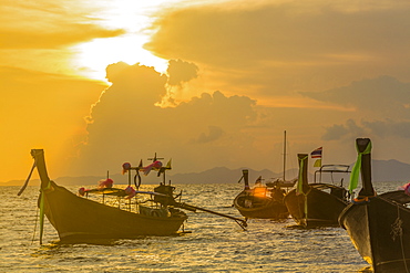 Boats at sunset in West Railay, Thailand