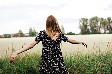 Young woman in field