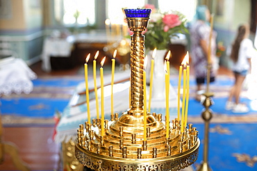 Candle holder in church during wedding