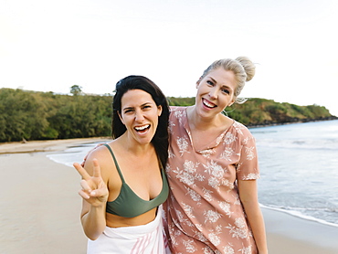 Smiling women on beach