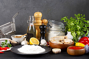 Raw ingredients including vegetables and flour