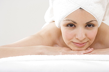 Portrait of woman laying on spa table