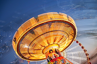 Long exposure of illuminated chain swing ride, Bangkok, Thailand