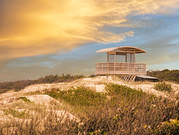 Lifeguard hut at sunset