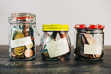 Euro currency in glass jars