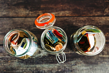 Euro currency in glass jars