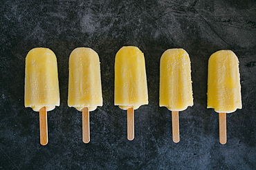 Row of lemon ice pops