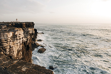 Building on cliff by sea in Peniche, Portugal